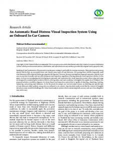 An Automatic Road Distress Visual Inspection System Using an