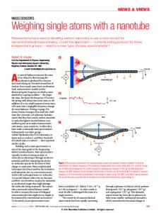 Weighing single atoms with a nanotube